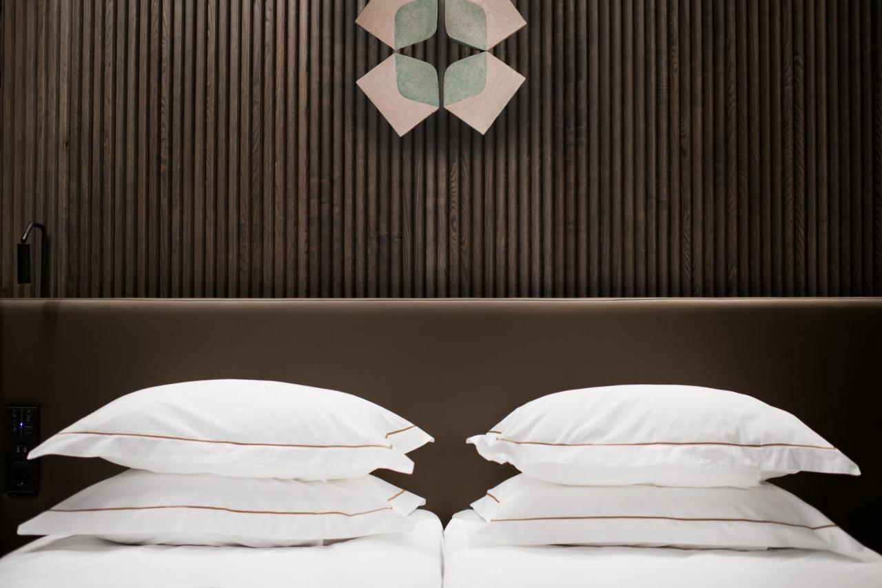 Mana Sleep & Spa Druskininkai Exterior photo A bed with two pillows